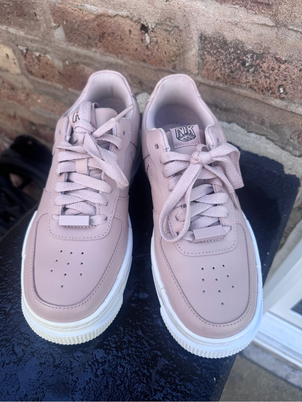 Nike blush pink leather Air Force ones